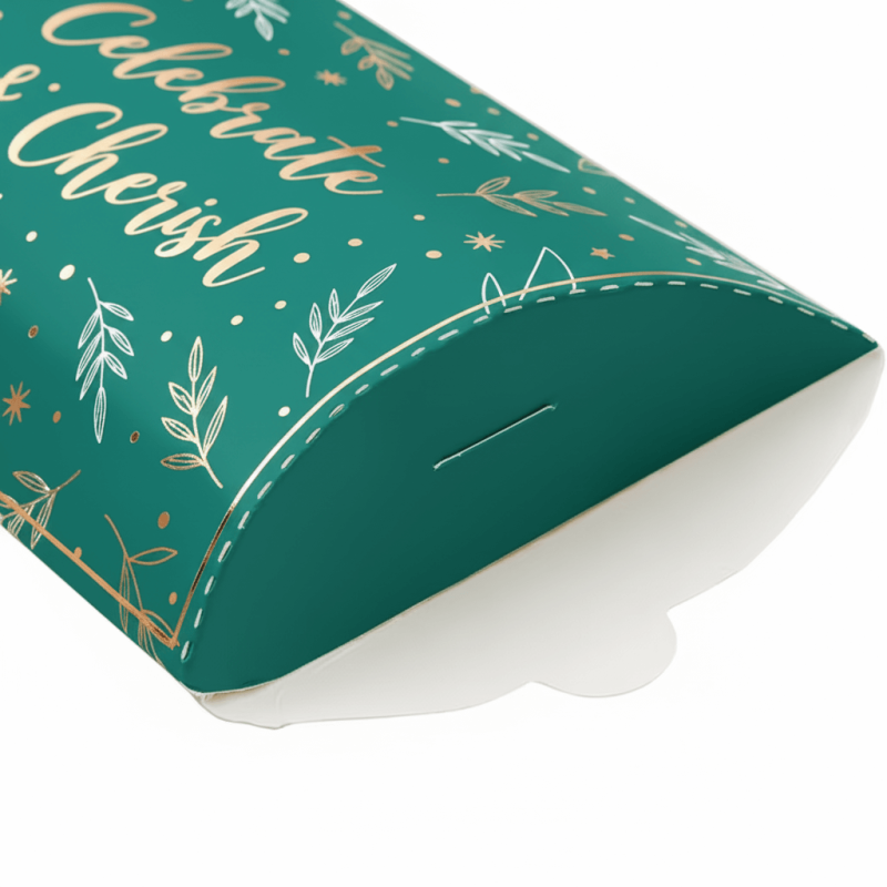A small brown kraft **pillow box** with gold foil stamping, used for wedding candy favors.