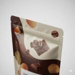 A luxury **matte black stand up pouch** with glossy spot UV logo printing, containing gourmet potato chips.