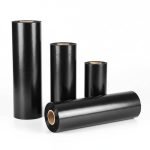 A premium **black vacuum sealer bags** pouch containing a fresh steak, showing the high-contrast black back and clear front.