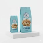 A custom **digital printed pouch** with vibrant coffee bean graphics, standing on a wooden surface.