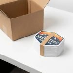 A group of custom die cut stickers with vibrant cartoon designs on a waterproof vinyl background.