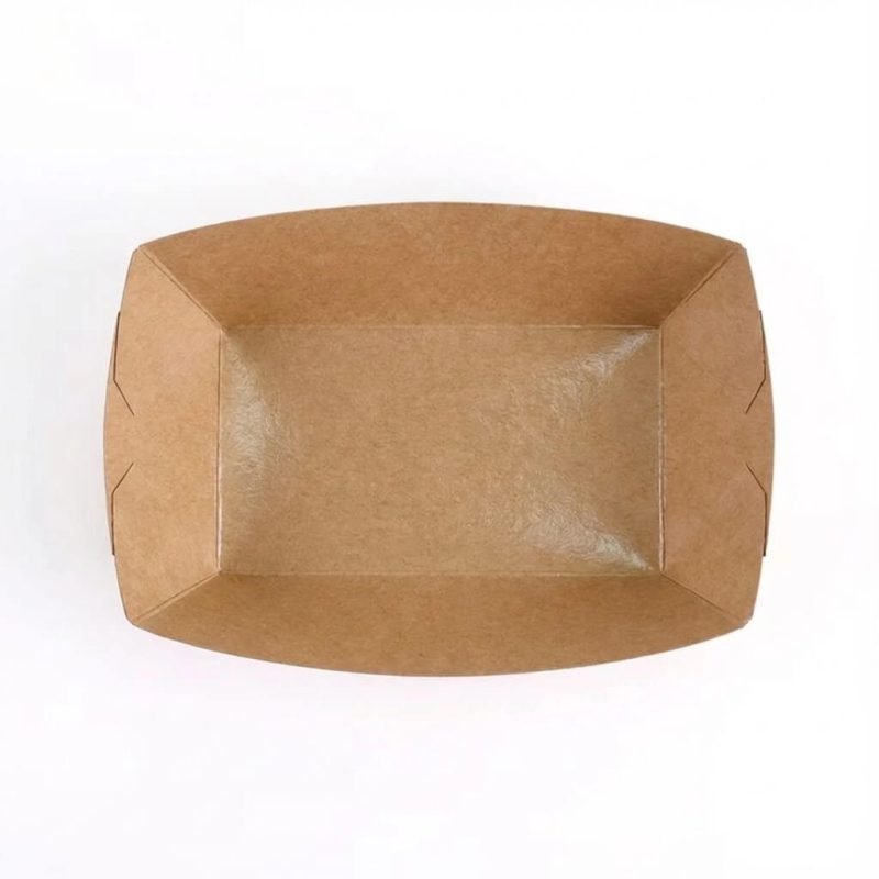 A disposable kraft paper boat tray filled with golden french fries and a hot dog.