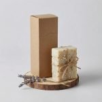 A rectangular 350gsm kraft paper folding box with a tuck end closure for essential oil packaging.
