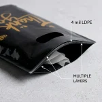 die cut handle plastic bags applied on luxury gift packaging demonstrating 3D laser reflection