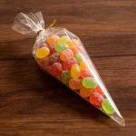 Industrial packaging of clear plastic cone bags for snacks with custom width options for printing houses