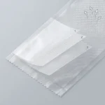 embossed vacuum sealer bags applied on luxury gift packaging demonstrating 3D laser reflection