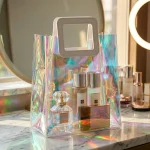 holographic pvc cosmetic pouch applied on luxury gift packaging demonstrating 3D laser reflection