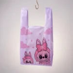 Close-up of plastic handle shopping bags surface with vertical holographic grating pattern