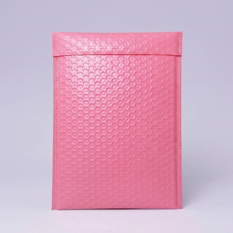 Close-up of heavy duty poly bubble mailers surface with vertical holographic grating pattern