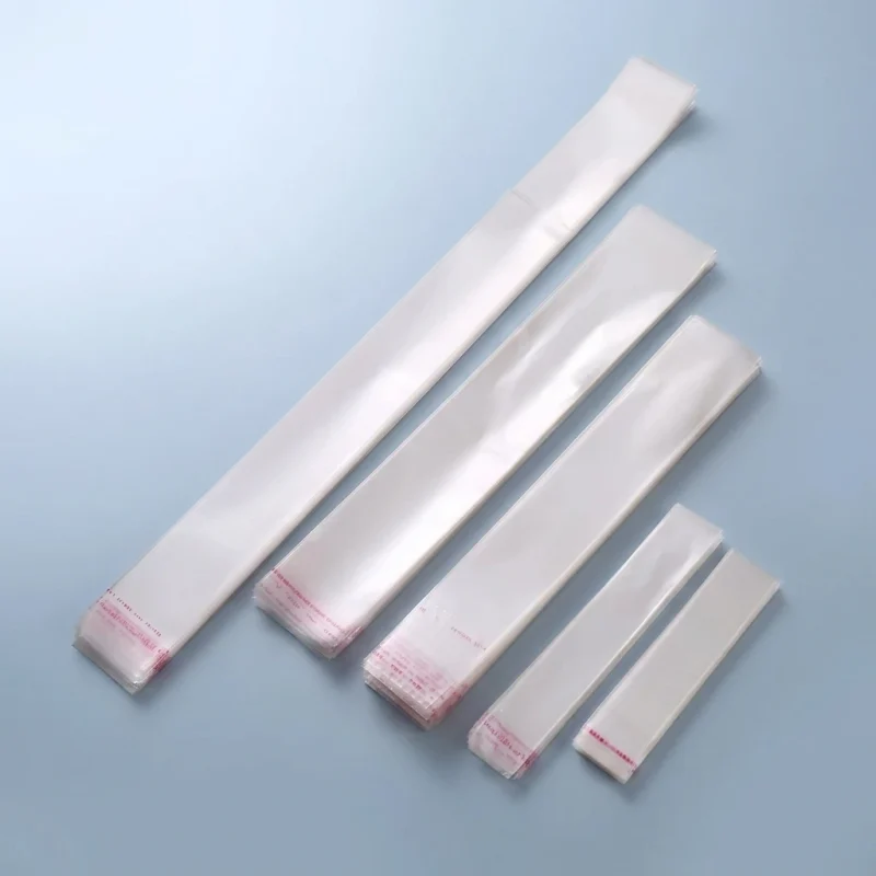 self adhesive OPP plastic bag showing prismatic rainbow effect on transparent soft BOPP base