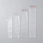 Close-up of self adhesive OPP plastic bag surface with vertical holographic grating pattern