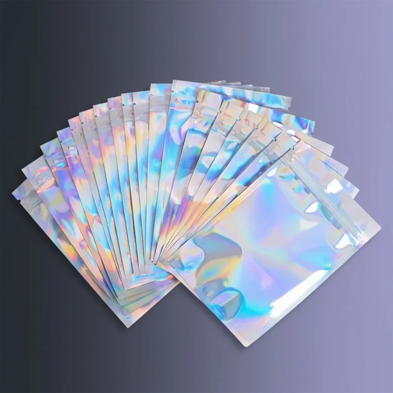 Holographic zip lock bags showing prismatic rainbow effect on transparent soft BOPP base